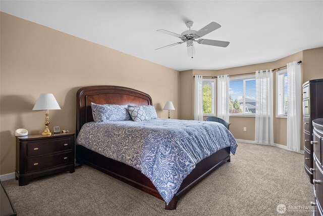 16520 136th Ave E, Puyallup, WA 98374 - bedroom with carpet, baseboards, and ceiling fan