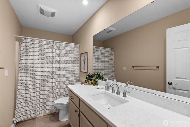 16520 136th Ave E, Puyallup, WA 98374 - bathroom with toilet, vanity, tile patterned flooring, and a shower with curtain