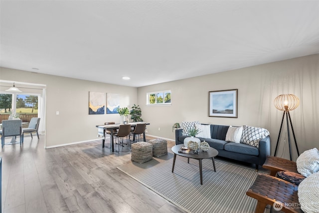 15235 105th Ave SE, Yelm, WA 98597 - living room featuring healthy amount of natural light, wood finished floors, and recessed lighting