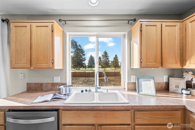 15235 105th Ave SE, Yelm, WA 98597 - kitchen featuring stainless steel dishwasher, light brown cabinetry, and light countertops