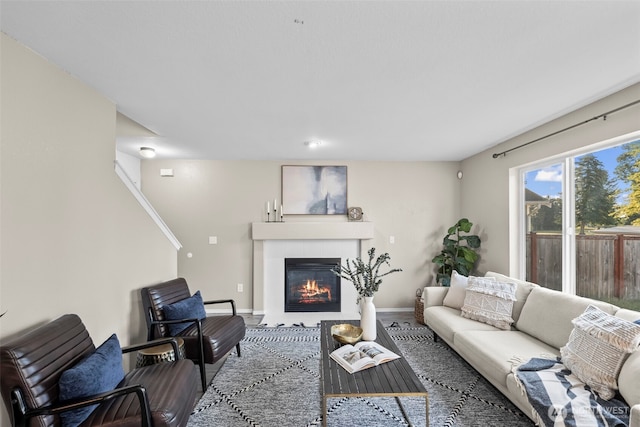 15235 105th Ave SE, Yelm, WA 98597 - living area featuring a tiled fireplace and wood finished floors