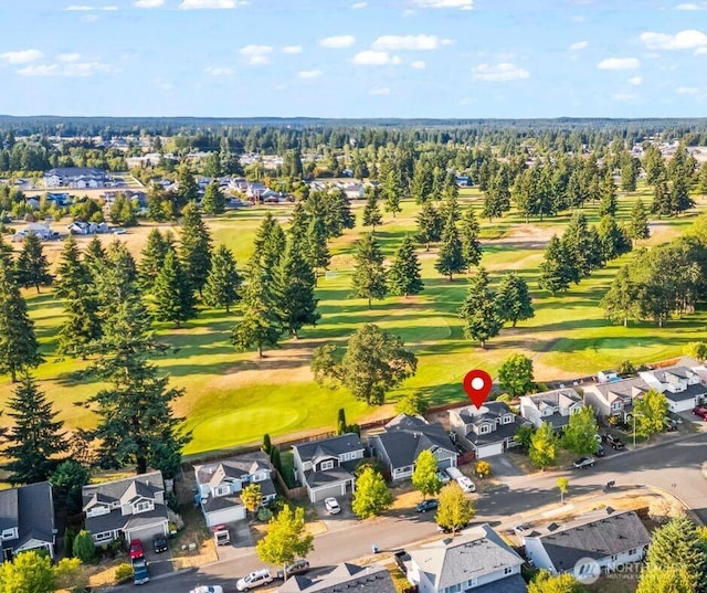 15235 105th Ave SE, Yelm, WA 98597 - aerial perspective of suburban area with a golf course