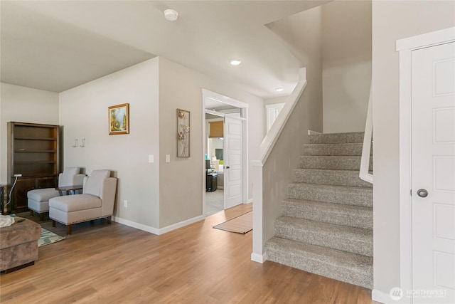 707 I St NE, Quincy, WA 98848 - stairs with wood finished floors, baseboards, and recessed lighting