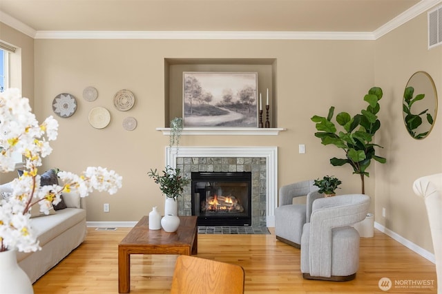 19799 NE Ash Crest Loop, Poulsbo, WA 98370 - living room with wood finished floors, baseboards, and ornamental molding