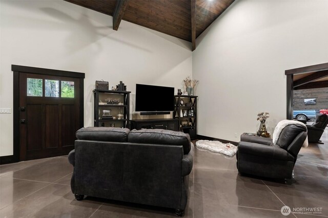 335 Brown Rd, Chehalis, WA 98532 - living room featuring wood ceiling with exposed beams, high vaulted ceiling, baseboards, and concrete floors