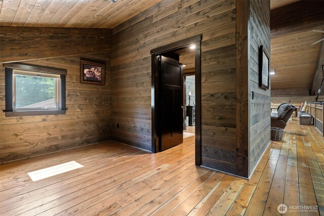 335 Brown Rd, Chehalis, WA 98532 - corridor featuring wooden walls, light wood-type flooring, and wood ceiling