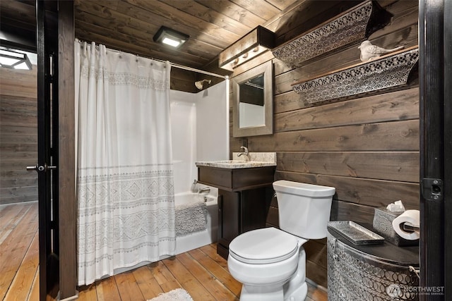 335 Brown Rd, Chehalis, WA 98532 - bathroom with shower / bath combo with shower curtain, toilet, hardwood / wood-style flooring, wooden walls, and vanity