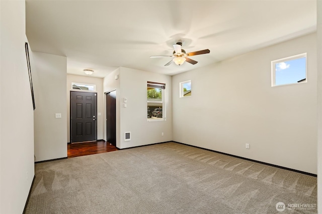 2212 N Creeksedge Way, Ellensburg, WA 98926 - carpeted empty room featuring ceiling fan and baseboards