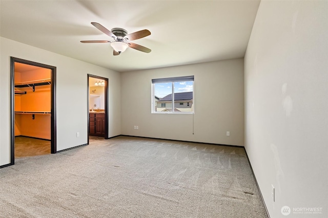 2212 N Creeksedge Way, Ellensburg, WA 98926 - unfurnished bedroom with carpet flooring, a spacious closet, a closet, and ensuite bath