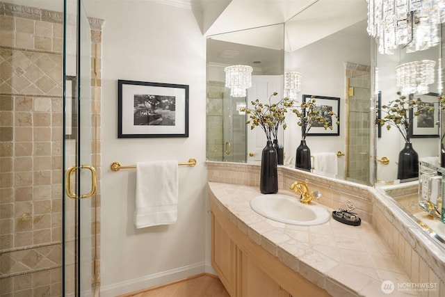 7 10th Ave, Kirkland, WA 98033 - full bathroom featuring a chandelier, a shower stall, vanity, and wood finished floors
