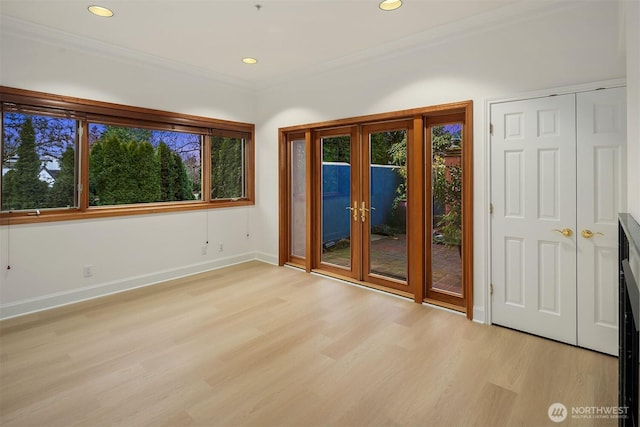 7 10th Ave, Kirkland, WA 98033 - empty room with light wood-type flooring, french doors, baseboards, recessed lighting, and crown molding