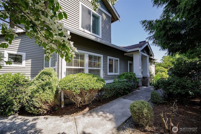 1110 63rd St E Unit 101, Auburn, WA 98092 - view of home's exterior featuring roof with shingles