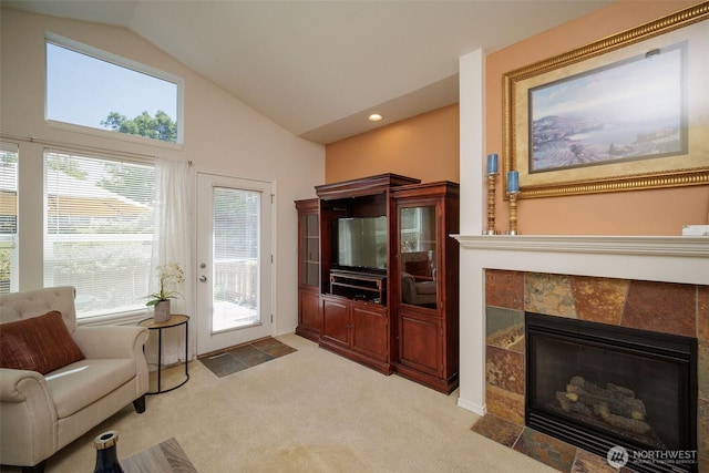 1110 63rd St E Unit 101, Auburn, WA 98092 - living area with light carpet, a fireplace, recessed lighting, and high vaulted ceiling
