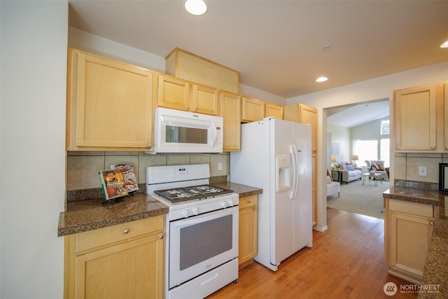 1110 63rd St E Unit 101, Auburn, WA 98092 - kitchen with white appliances, light brown cabinetry, recessed lighting, tasteful backsplash, and light wood finished floors