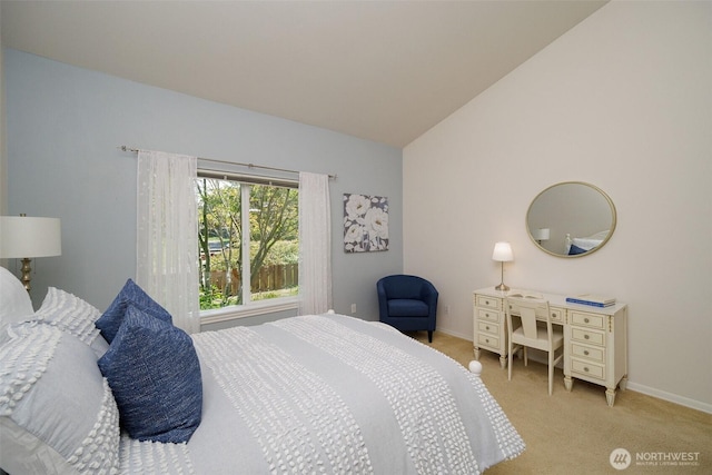 1110 63rd St E Unit 101, Auburn, WA 98092 - bedroom with baseboards, light carpet, and lofted ceiling