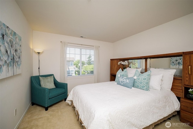 1110 63rd St E Unit 101, Auburn, WA 98092 - bedroom featuring light carpet and baseboards