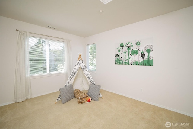 1110 63rd St E Unit 101, Auburn, WA 98092 - rec room featuring carpet and baseboards