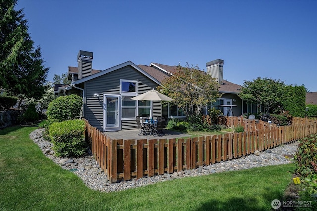 1110 63rd St E Unit 101, Auburn, WA 98092 - back of property with a chimney