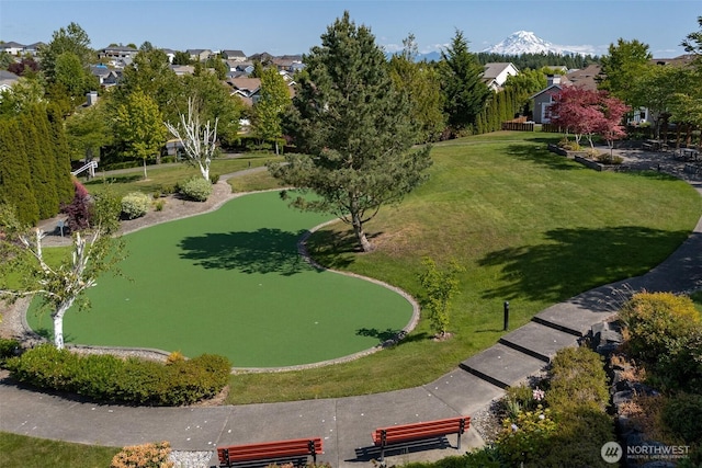 1110 63rd St E Unit 101, Auburn, WA 98092 - surrounding community with a lawn, a putting green, and a residential view