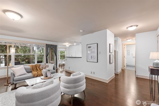 22910 90th Ave W Unit E406, Edmonds, WA 98026 - living area with dark wood-style flooring and baseboards