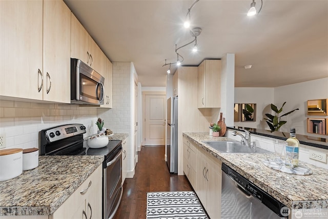 22910 90th Ave W Unit E406, Edmonds, WA 98026 - kitchen featuring appliances with stainless steel finishes, a sink, light brown cabinets, dark wood finished floors, and backsplash