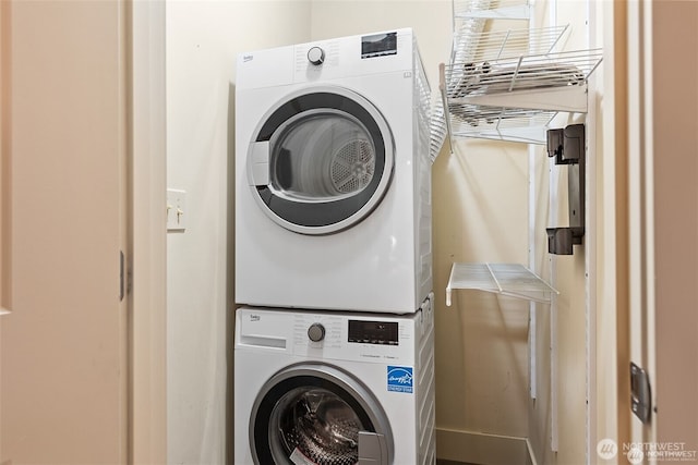 22910 90th Ave W Unit E406, Edmonds, WA 98026 - laundry area featuring stacked washer and clothes dryer