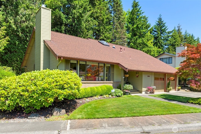 924 S 245th Pl, Des Moines, WA 98198 - view of front of property featuring an attached garage, concrete driveway, a front yard, a chimney, and roof with shingles