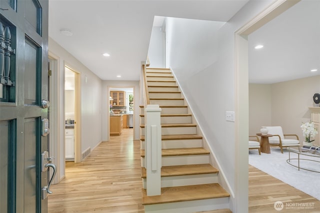 11750 NE 36th Pl, Bellevue, WA 98005 - staircase featuring wood finished floors and recessed lighting