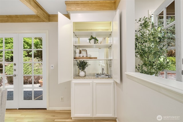 11750 NE 36th Pl, Bellevue, WA 98005 - indoor wet bar with light wood finished floors and beam ceiling