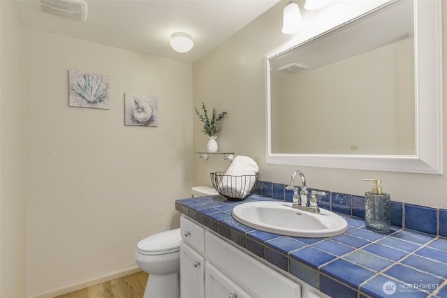11750 NE 36th Pl, Bellevue, WA 98005 - bathroom with wood finished floors and vanity