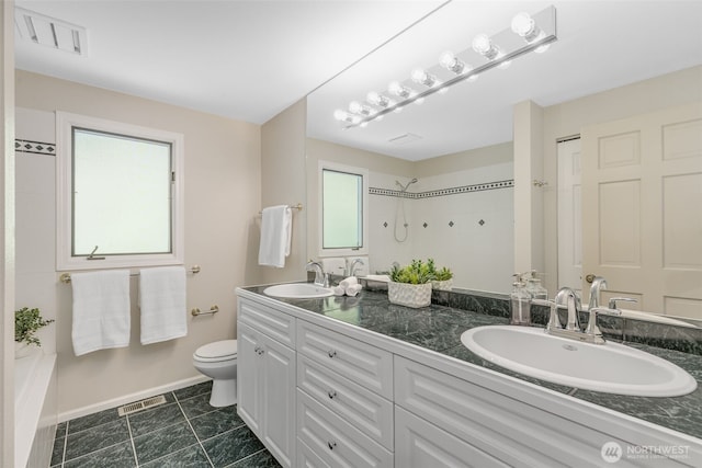 11750 NE 36th Pl, Bellevue, WA 98005 - bathroom featuring healthy amount of natural light, double vanity, and a shower