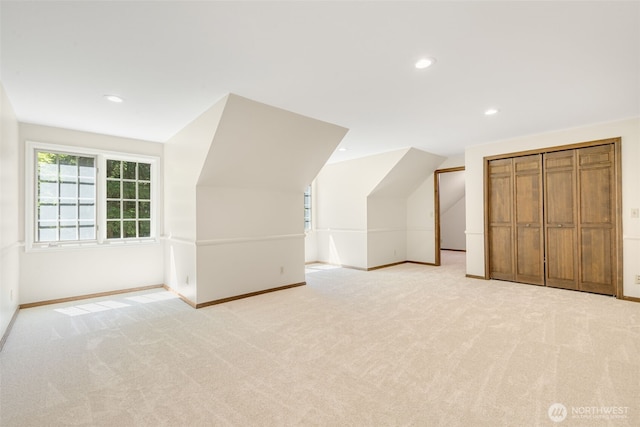 11750 NE 36th Pl, Bellevue, WA 98005 - additional living space with light colored carpet, recessed lighting, and lofted ceiling