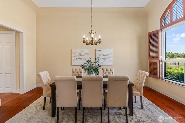 7212 Canterwood Dr SE, Olympia, WA 98513 - dining room with a chandelier and wood finished floors