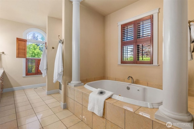 7212 Canterwood Dr SE, Olympia, WA 98513 - full bathroom with decorative columns, a whirlpool tub, vanity, and tile patterned flooring