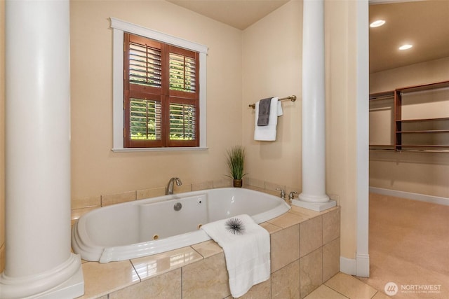 7212 Canterwood Dr SE, Olympia, WA 98513 - bathroom featuring decorative columns, a jetted tub, recessed lighting, and tile patterned floors