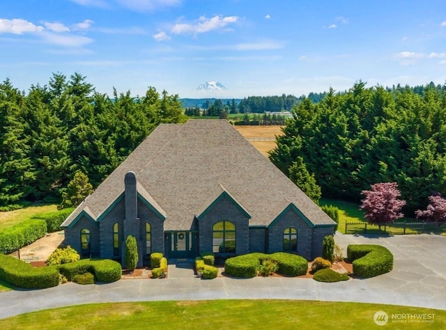 7212 Canterwood Dr SE, Olympia, WA 98513 - view of front facade with a shingled roof