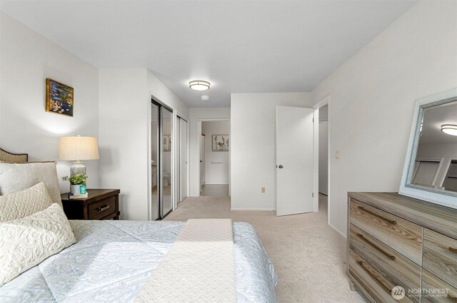 4152 Providence Point Dr SE Unit 207, Issaquah, WA 98029 - bedroom featuring light colored carpet and a closet