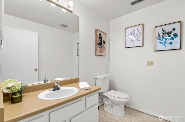 4152 Providence Point Dr SE Unit 207, Issaquah, WA 98029 - bathroom with toilet, vanity, tile patterned floors, and baseboards