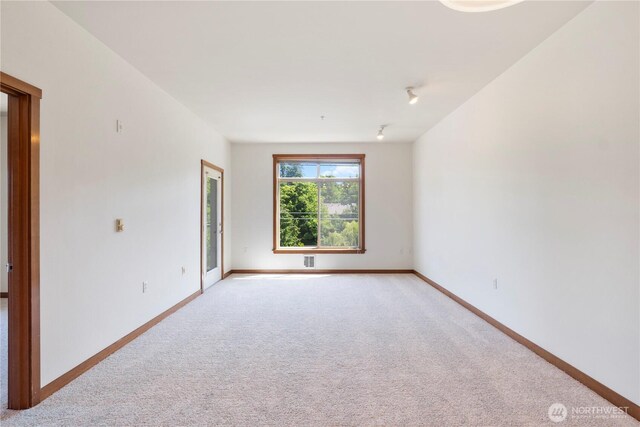 910 Gladstone St Unit 307, Bellingham, WA 98229 - empty room featuring light colored carpet and baseboards