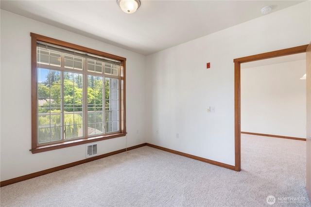 910 Gladstone St Unit 307, Bellingham, WA 98229 - carpeted empty room with baseboards and a smoke detector