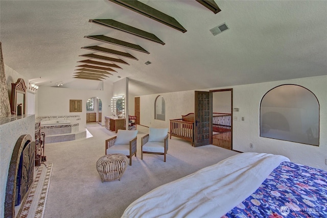 13311 SE 290th St, Auburn, WA 98092 - bedroom featuring a textured ceiling, carpet, and arched walkways