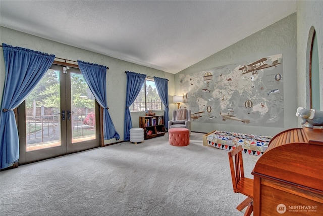 13311 SE 290th St, Auburn, WA 98092 - carpeted bedroom featuring access to outside, lofted ceiling, french doors, a textured wall, and a textured ceiling