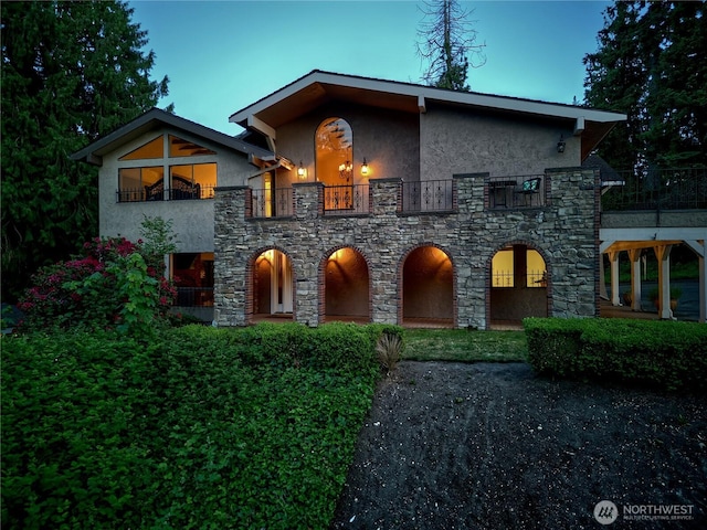 13311 SE 290th St, Auburn, WA 98092 - contemporary home featuring a balcony, stucco siding, and stone siding