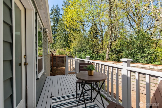 2330 NE 103rd St, Seattle, WA 98125 - wooden deck with view of scattered trees