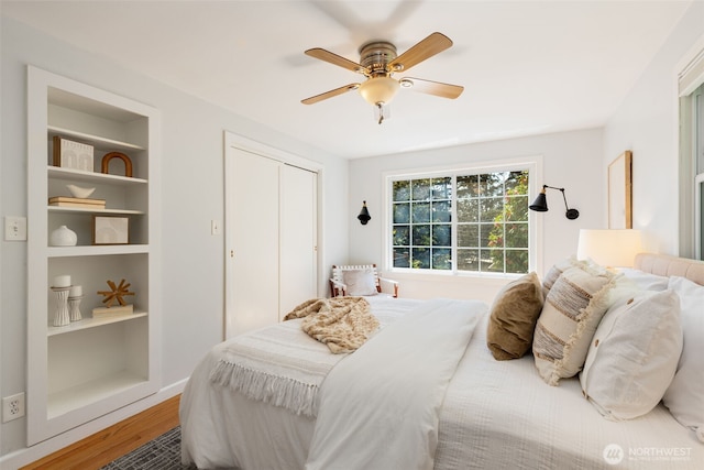 2330 NE 103rd St, Seattle, WA 98125 - bedroom featuring wood finished floors, ceiling fan, and a closet