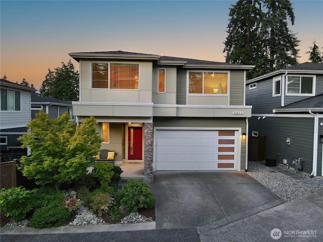 3071 S 276th Ct, Auburn, WA 98001 - view of front facade with driveway, an attached garage, covered porch, and roof with shingles