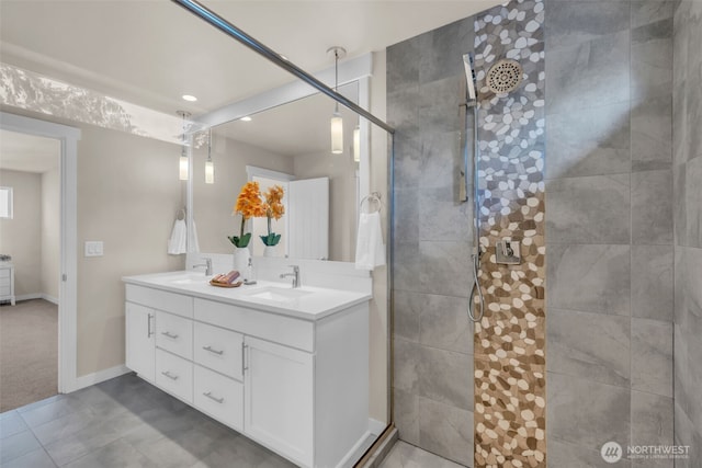3071 S 276th Ct, Auburn, WA 98001 - bathroom featuring a tile shower, double vanity, recessed lighting, and tile patterned floors