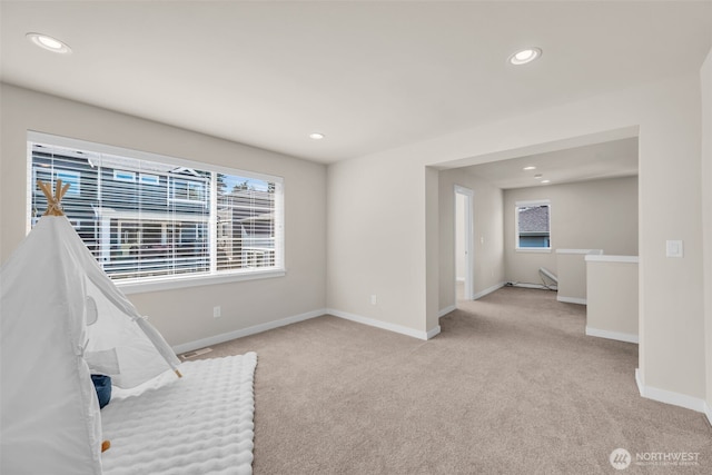 3071 S 276th Ct, Auburn, WA 98001 - unfurnished room with carpet flooring, recessed lighting, and an upstairs landing