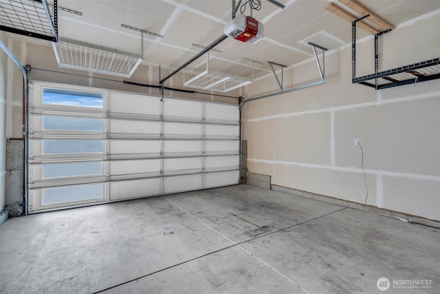 3071 S 276th Ct, Auburn, WA 98001 - garage featuring a garage door opener