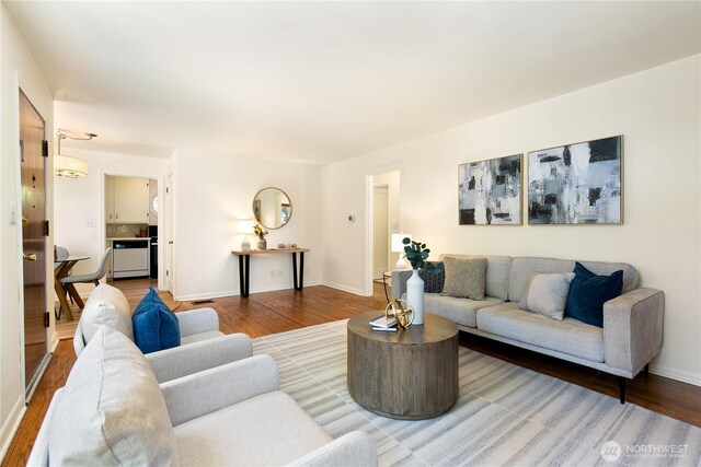 1536 NE 95th St, Seattle, WA 98115 - living area featuring wood finished floors and baseboards